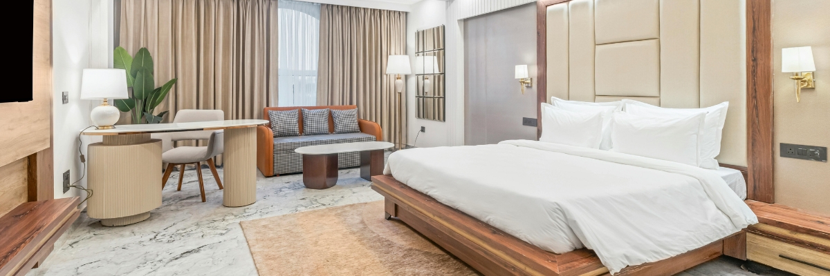 Modern bespoke bedroom with fitted wardrobes and smart storage solutions